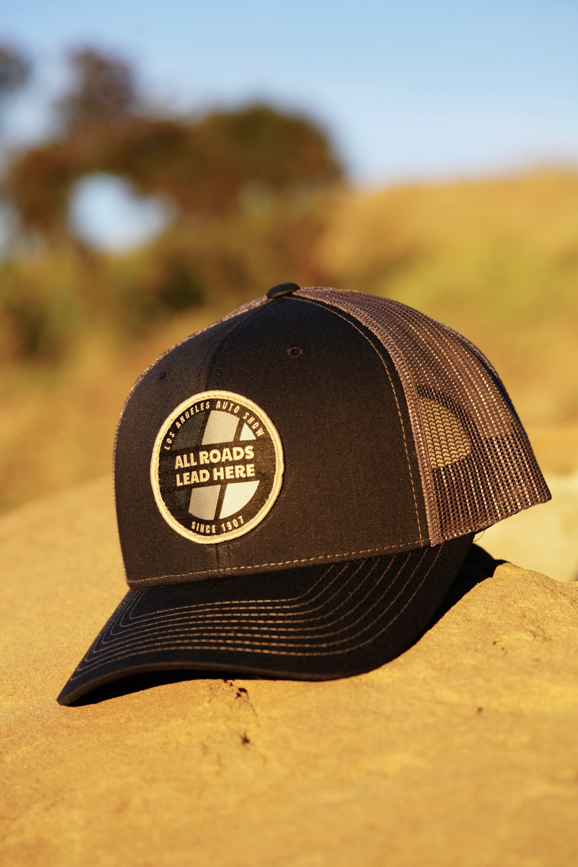 LAAS23 CIRCLE TRUCKER HAT (Navy/Charcoal)