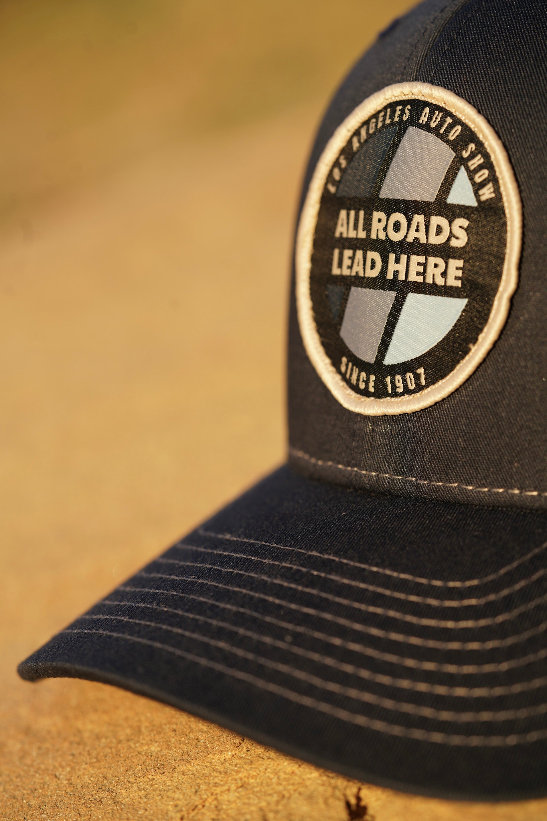 LAAS23 CIRCLE TRUCKER HAT (Navy/Charcoal)