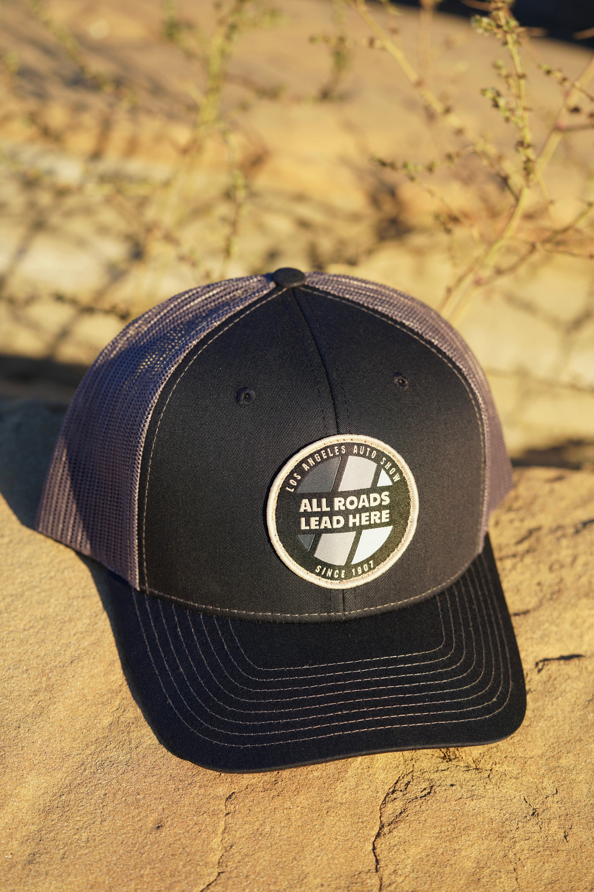 LAAS23 CIRCLE TRUCKER HAT (Navy/Charcoal)