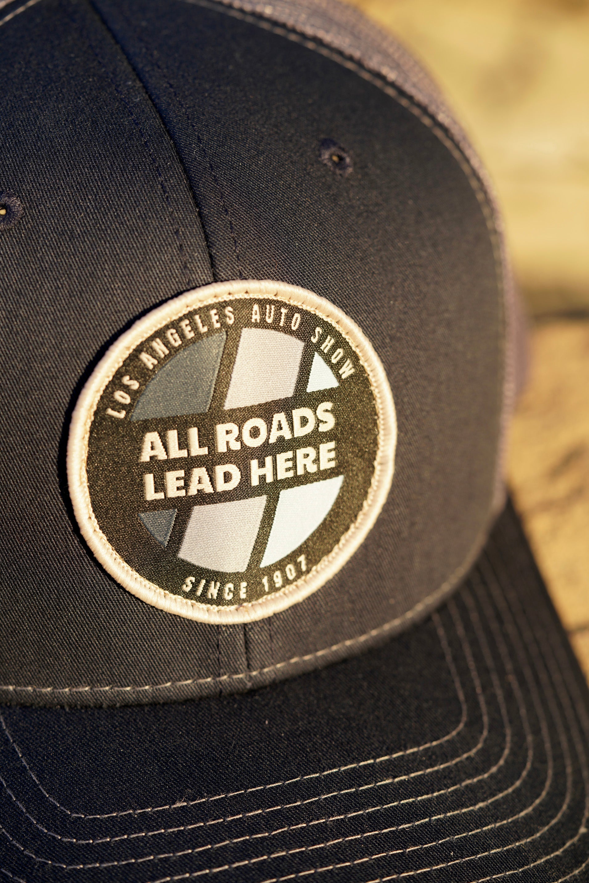 LAAS23 CIRCLE TRUCKER HAT (Navy/Charcoal)